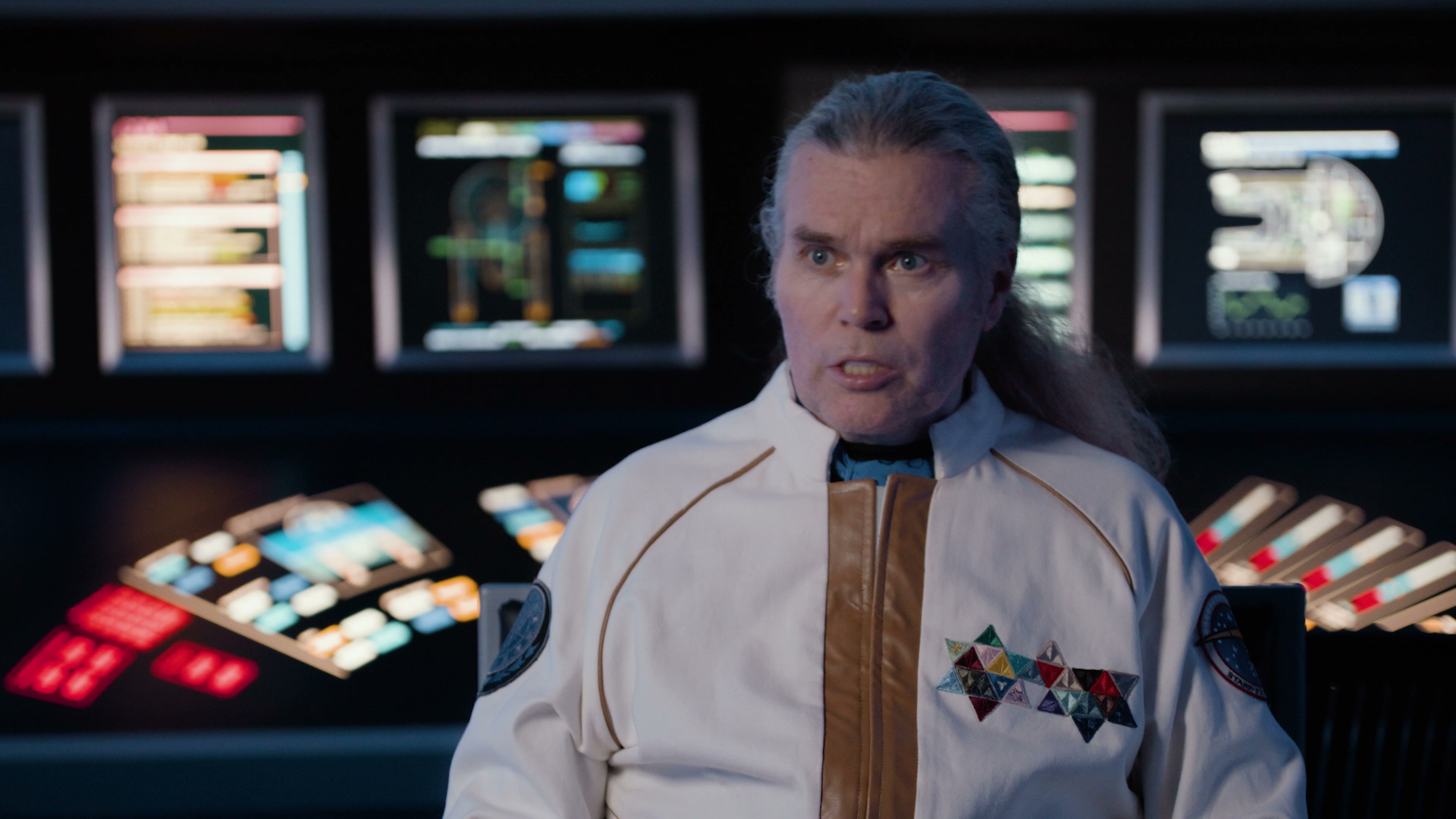 Starfleet officer in dress whites — bridge interview