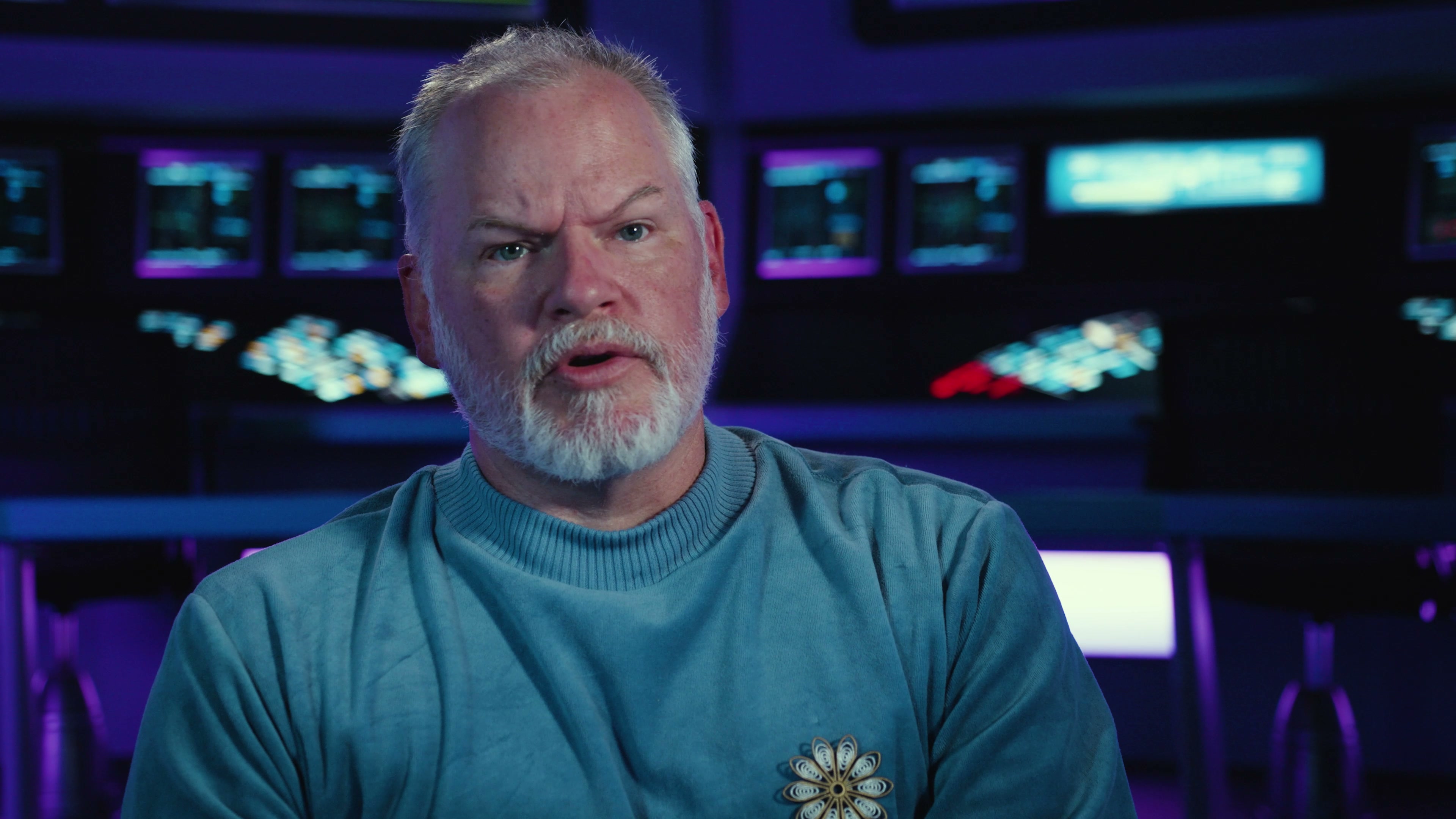 Commodore V.A. Sturm on the Ares bridge set