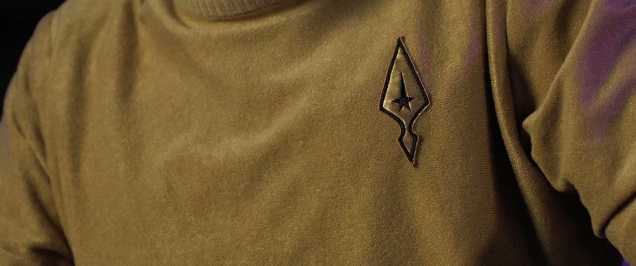 Starfleet delta on gold duty tunic